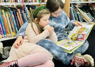 Reading Ambassadors (Eddie and Alice) and all of Y6 accompanying Y1 children to Haslingden Library